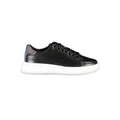 Chaussures femme Calvin Klein en cuir noir, baskets sport élégantes avec semelle blanche visible.