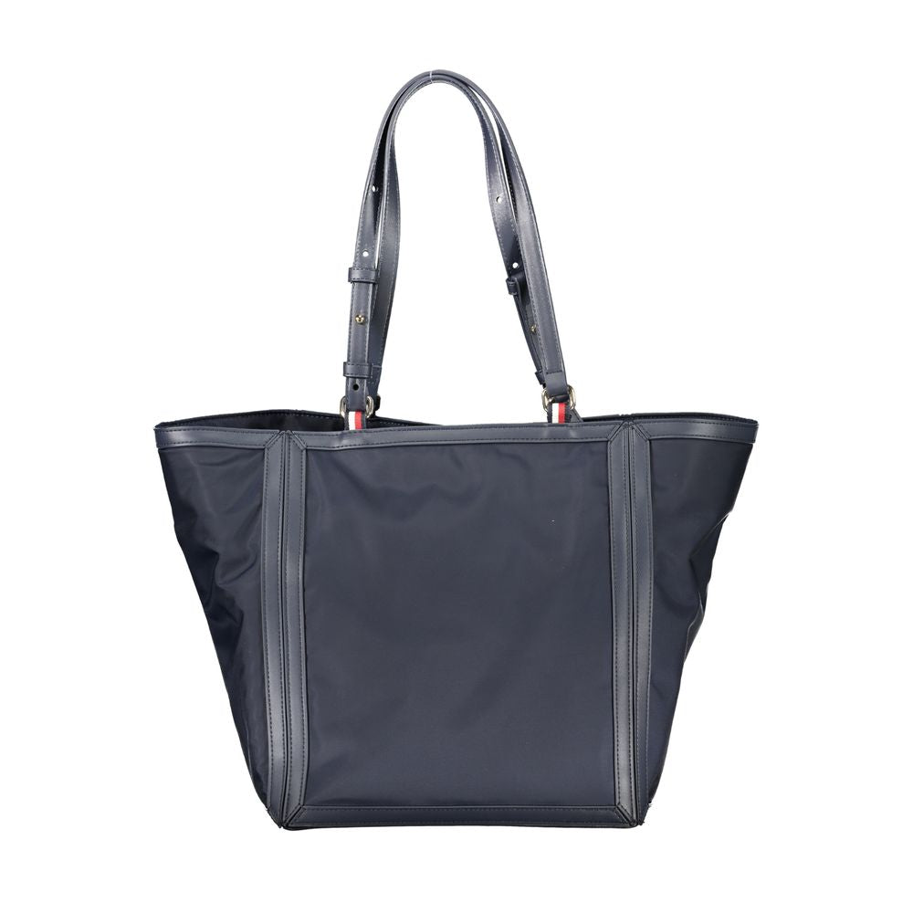 Sac à main en polyester bleu pour femme de la marque Tommy Hilfiger, avec poignées et détails élégants.