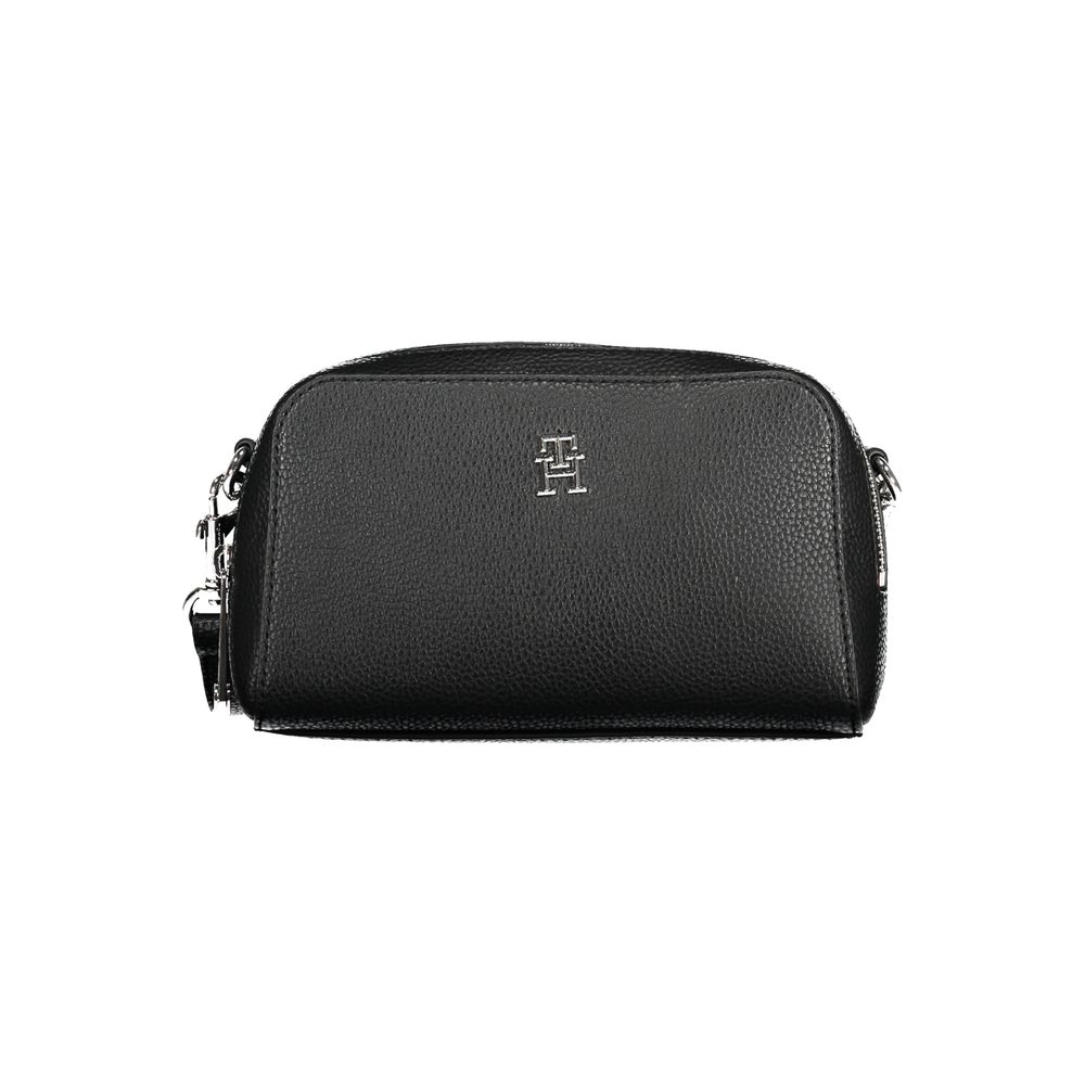 Sac à bandoulière Tommy Hilfiger en polyuréthane noir pour femme, avec détails élégants et logo visible.