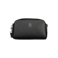 Sac à bandoulière Tommy Hilfiger en polyuréthane noir pour femme, avec détails élégants et logo visible.