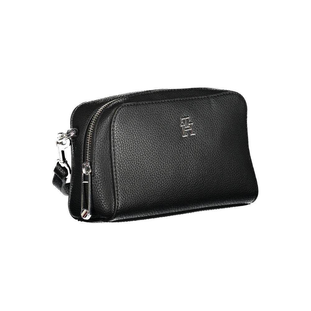 Sac à main Tommy Hilfiger en polyuréthane noir pour femme, bandoulière élégante et design moderne.
