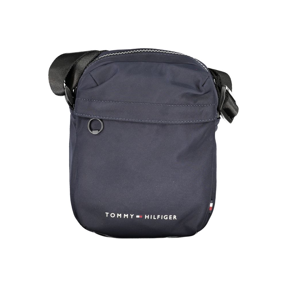 Sac homme Tommy Hilfiger en polyester recyclé bleu, sacoche d'épaule élégante avec logo de la marque visible.