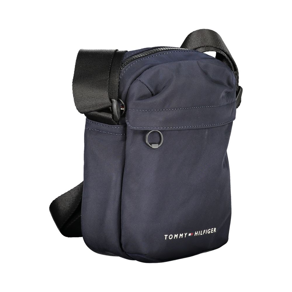 Sac à bandoulière Tommy Hilfiger en polyester recyclé bleu pour homme, avec poches et design élégant visible sur l'image.