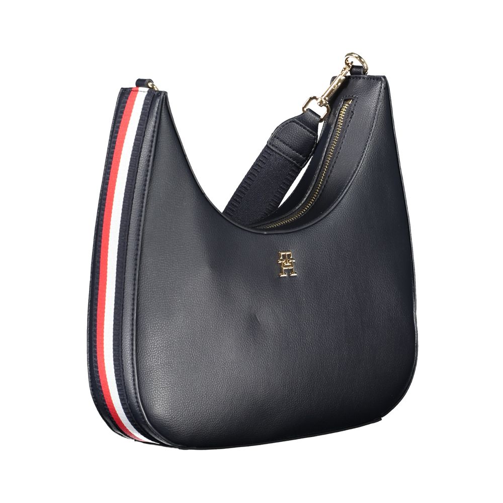 Sac à épaule pour femmes Tommy Hilfiger en polyester bleu avec détails élégants, idéal pour un style chic et pratique.