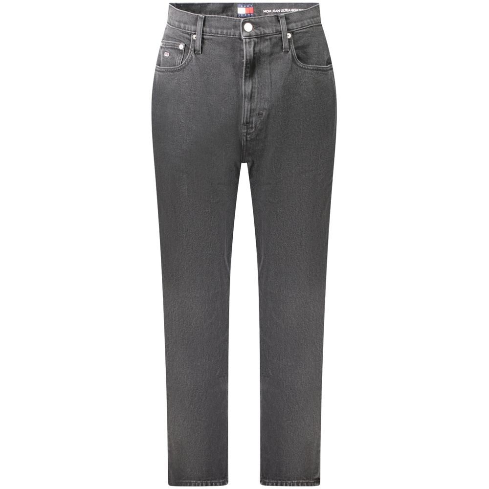Jeans femme en coton noir Tommy Hilfiger, coupe classique, détails élégants, porté sur un fond neutre.