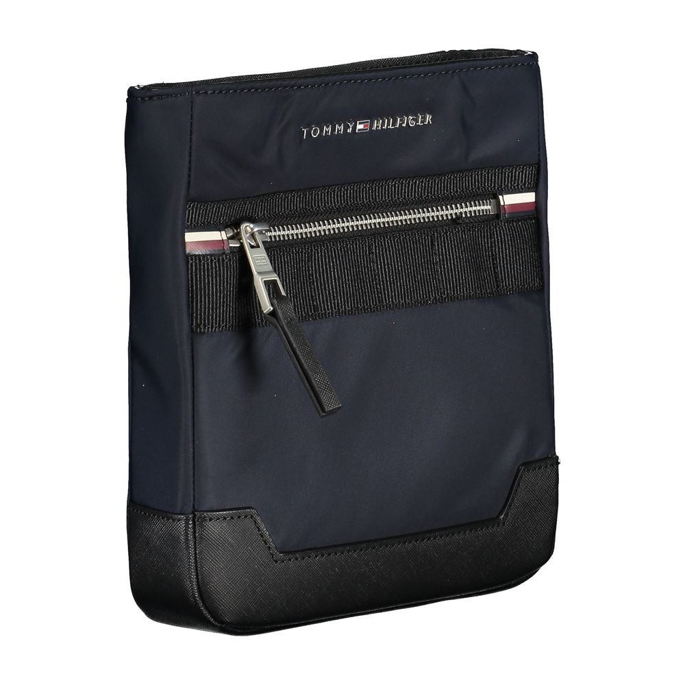 Sac à bandoulière pour homme Tommy Hilfiger en polyester bleu, avec compartiments et logo visible.
