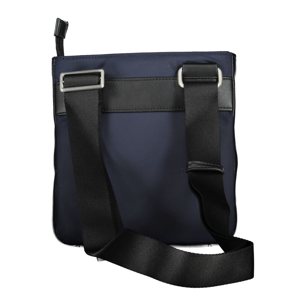 Sac à bandoulière homme Tommy Hilfiger en polyuréthane bleu, avec détails élégants et bandoulière ajustable.