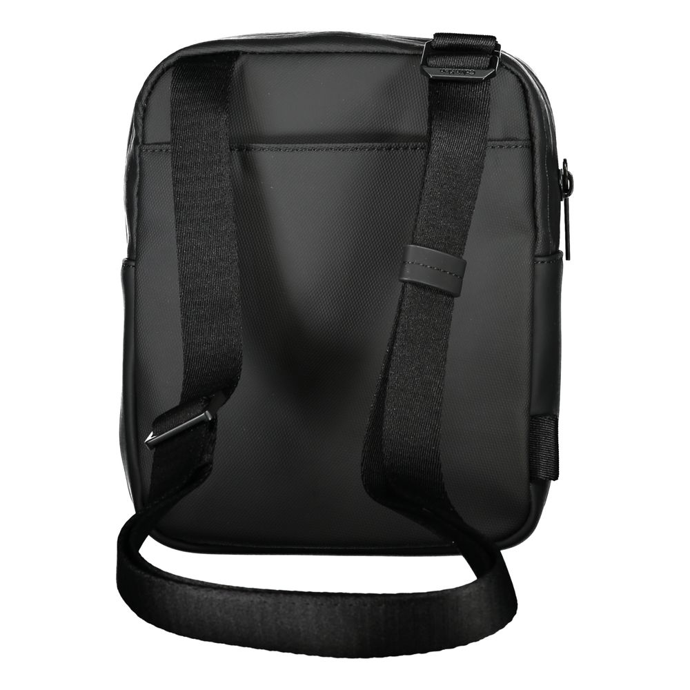 Sac à bandoulière Calvin Klein en polyester recyclé noir élégant avec détails modernes et logo de la marque.