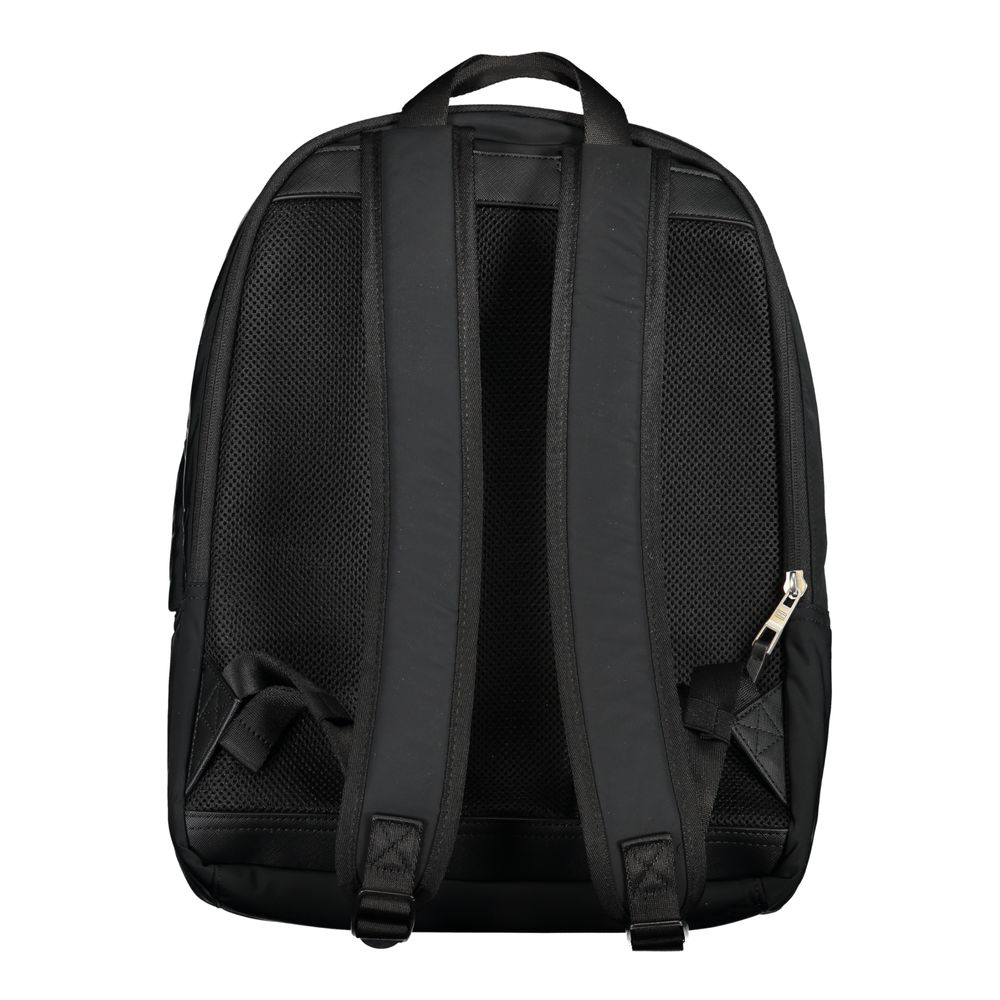 Sac à dos homme Tommy Hilfiger en polyester noir, avec compartiments et logo visible sur la poche frontale.
