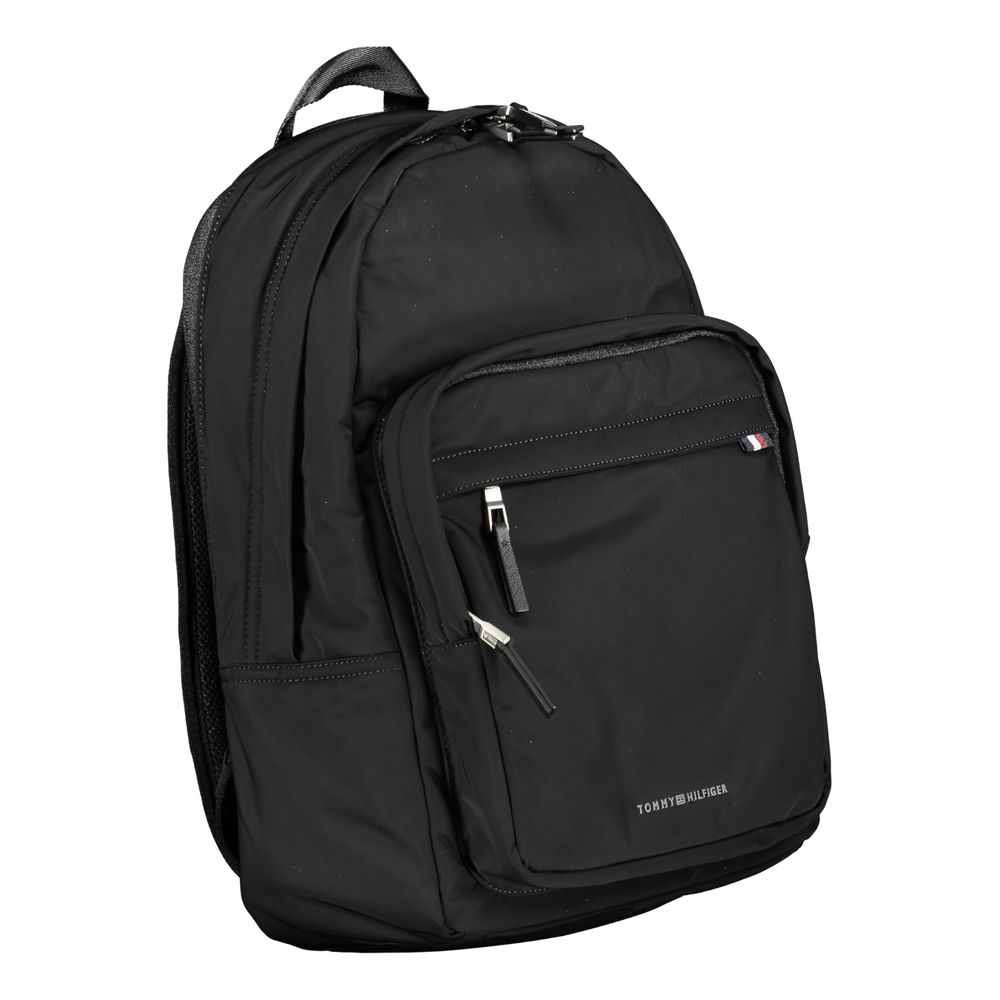 Sac à dos pour homme Tommy Hilfiger en polyester noir, avec plusieurs compartiments et détails élégants.