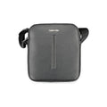 Sac à bandoulière noir en polyester pour homme de la marque Calvin Klein, avec bandoulière ajustable et design élégant.
