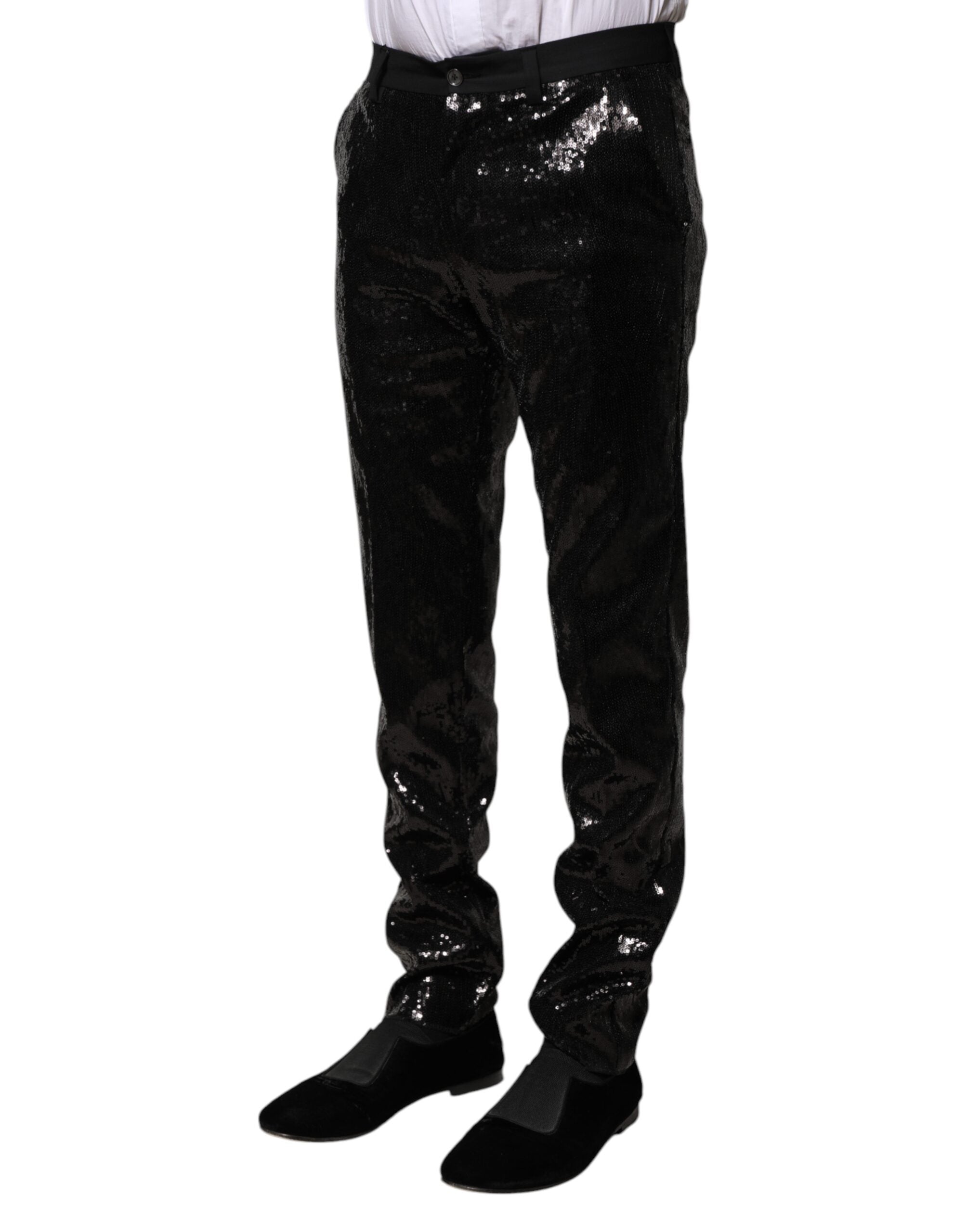 Pantalon noir Dolce & Gabbana avec embellissements en sequins brillants et détails ornementaux élégants.