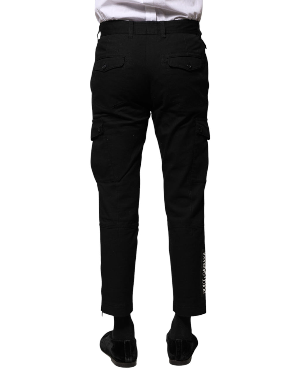 Pantalon homme Dolce & Gabbana en coton noir, style formel, coupe cropped, visible sur l'image.