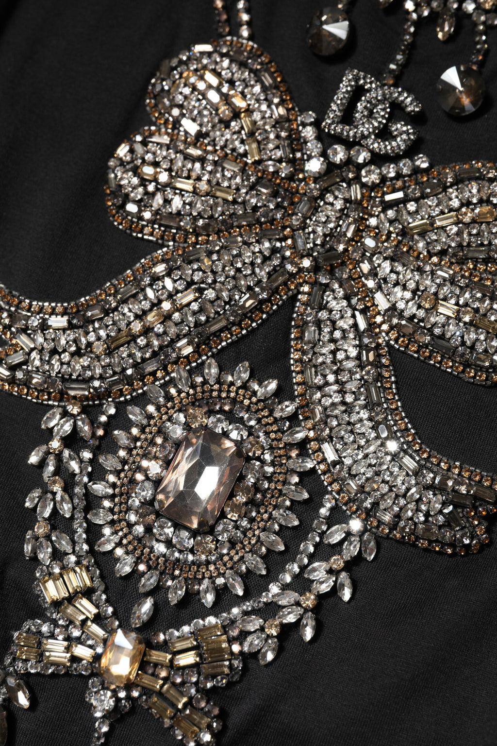 Débardeur noir en coton de Dolce & Gabbana avec broderies de strass, élégant et orné pour un look sophistiqué.