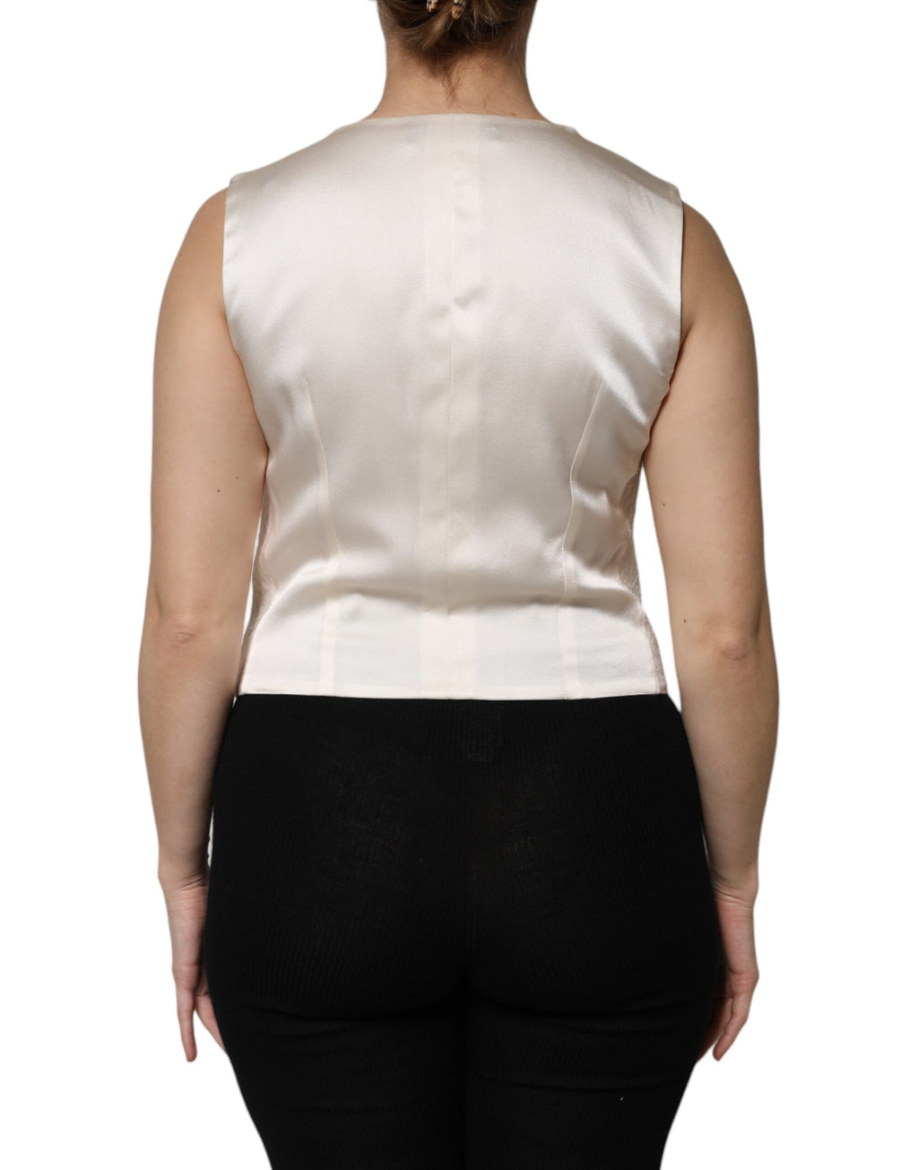 Veste sans manches en coton ivoire Dolce & Gabbana à boutons, vêtement élégant et léger pour femme.