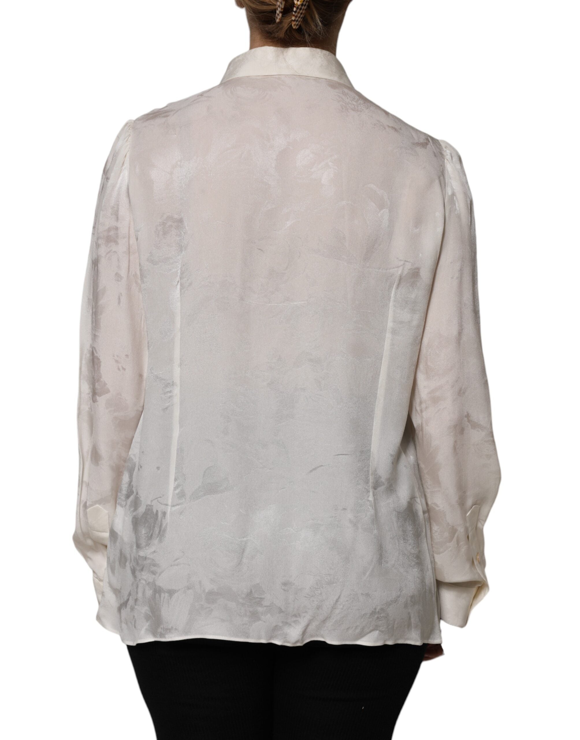 Chemise blanche Dolce & Gabbana à manches longues avec boutons, élégante et sophistiquée, vue de face.