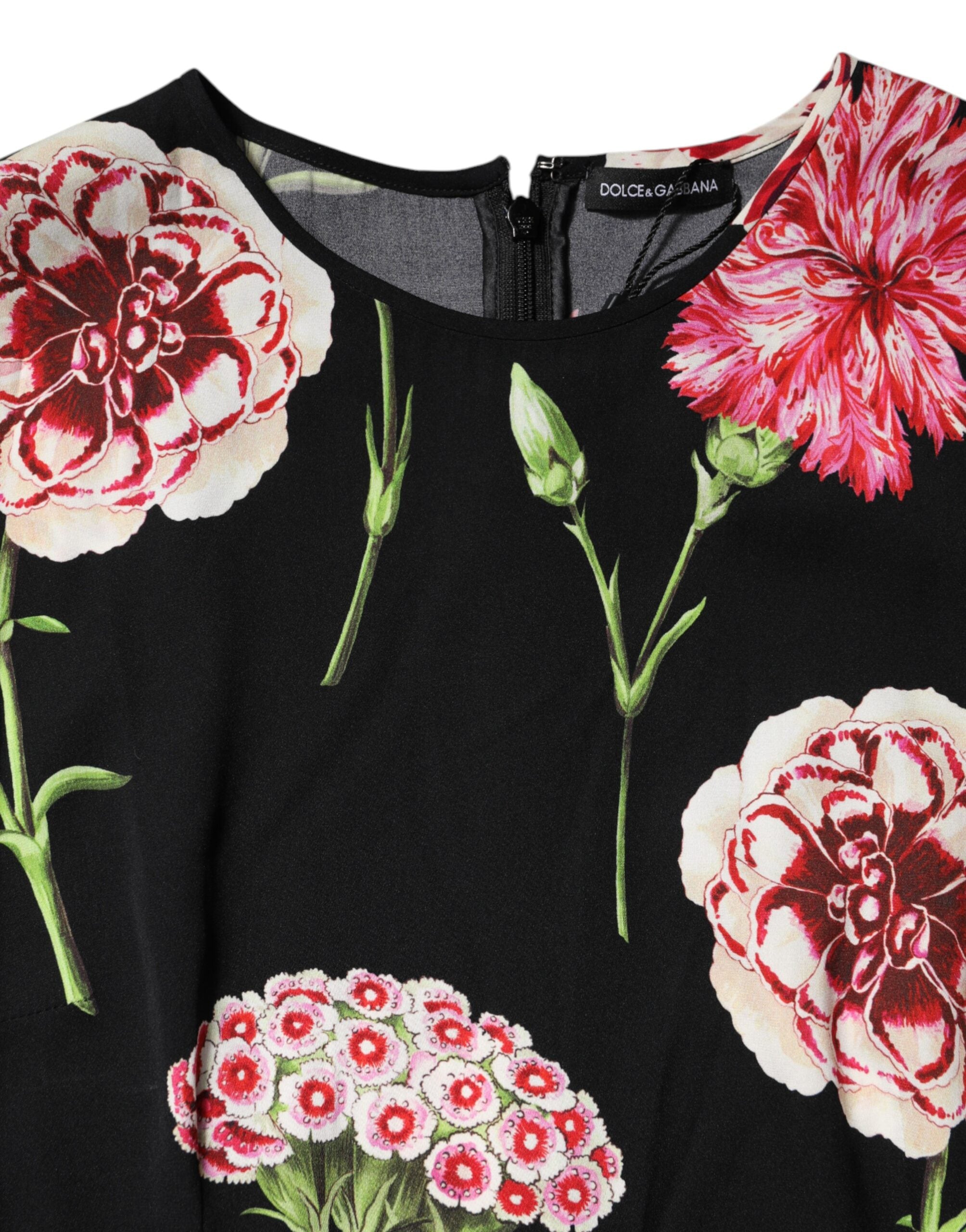 Haut sans manches Dolce & Gabbana, blouse à imprimé floral noir, style élégant et moderne, visible en détail sur l'image.