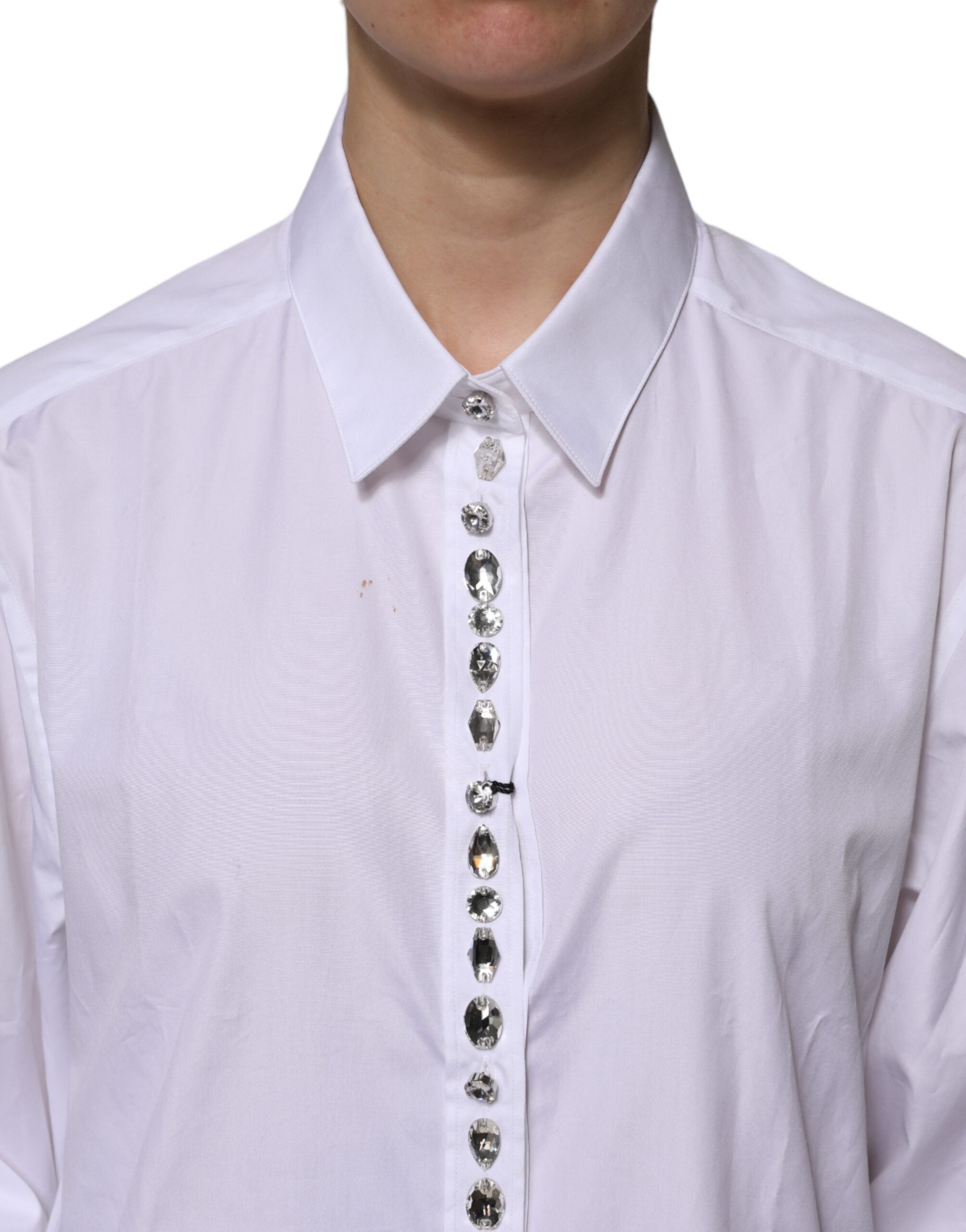 Haut blanc Dolce & Gabbana à manches longues avec embellissements en strass et détails élégants.