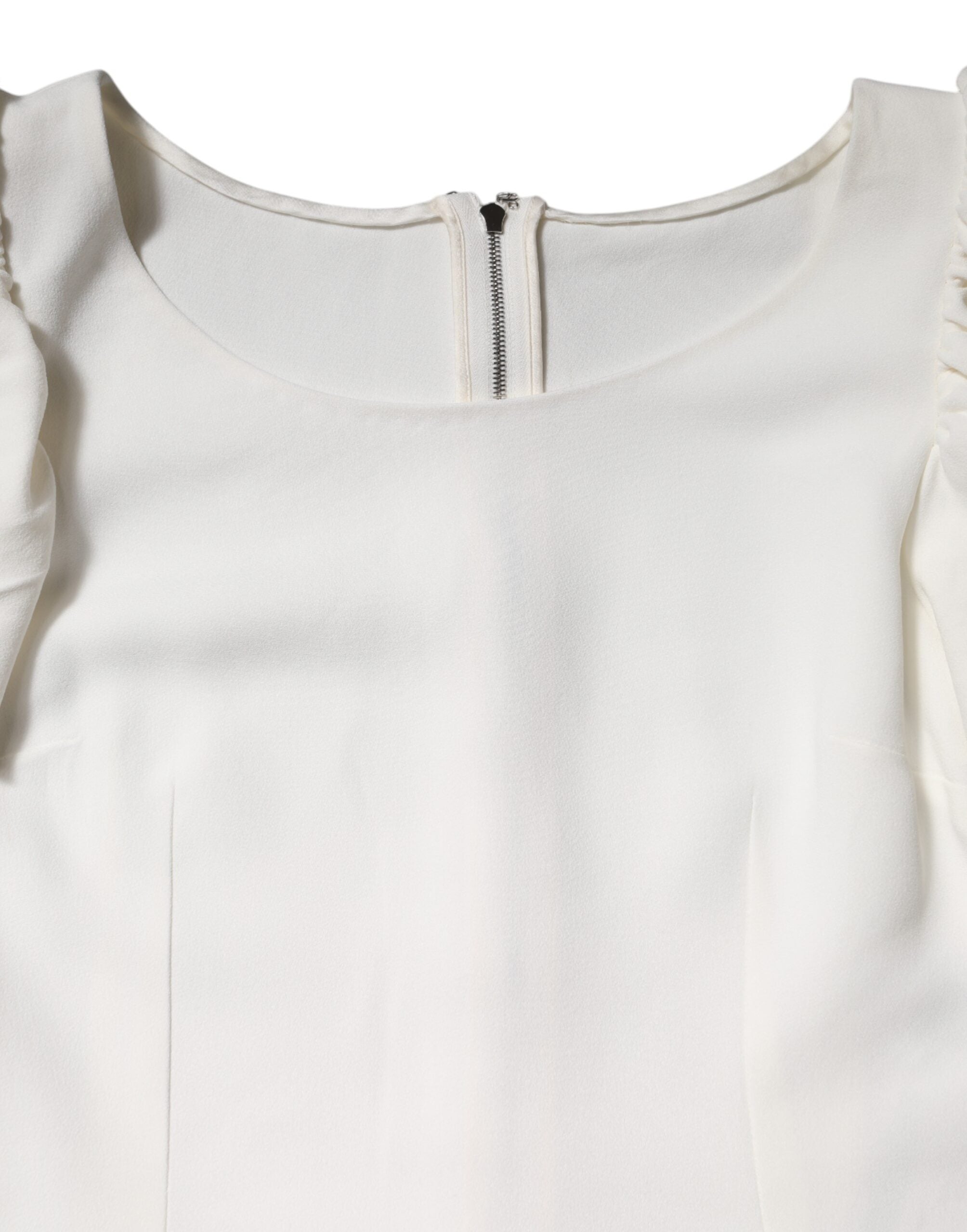 Haut blanc en viscose Dolce & Gabbana à col rond et manches courtes, élégant et léger, visible en détail.