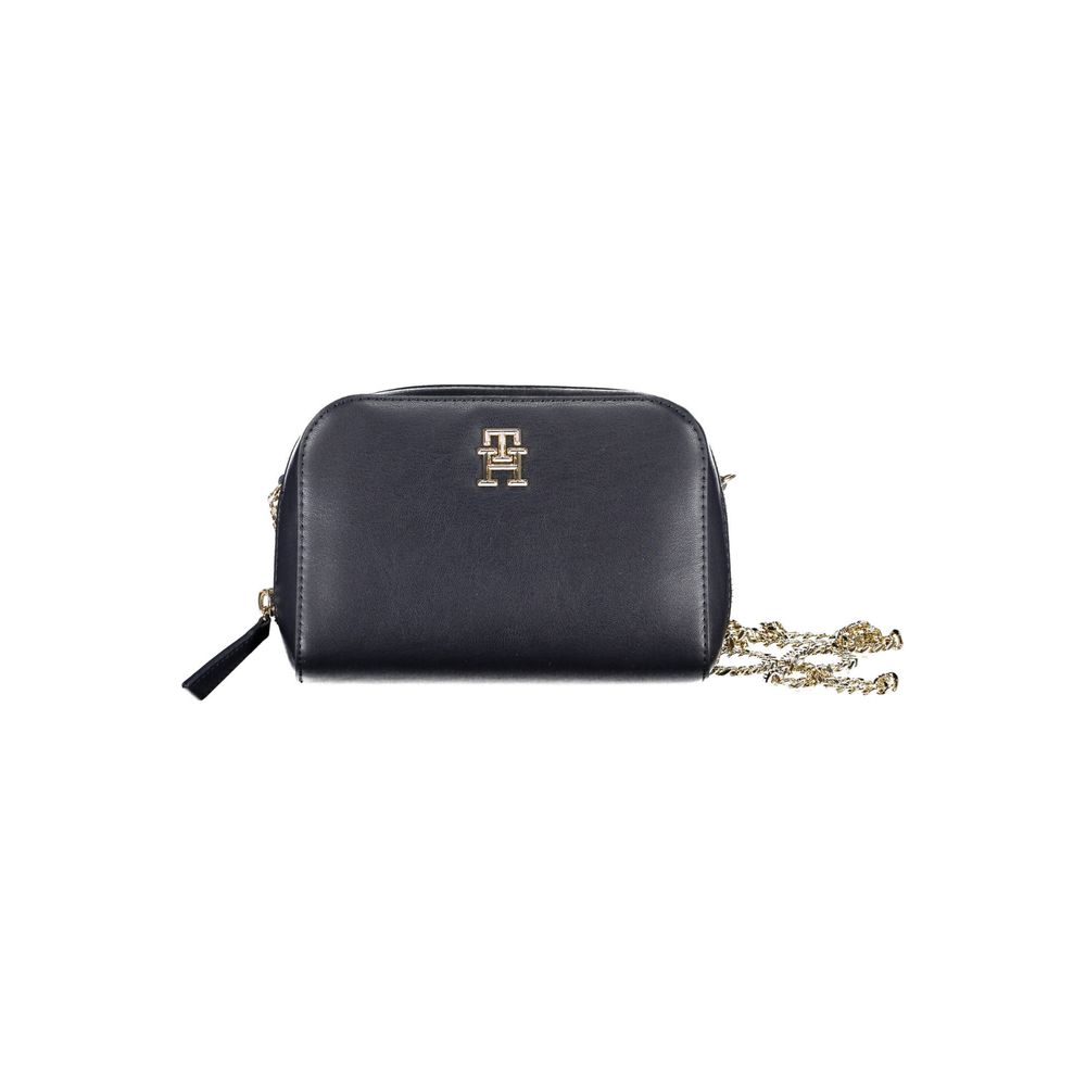Sac à main féminin Tommy Hilfiger en polyuréthane bleu, avec poignée et détails élégants, pour un style moderne.