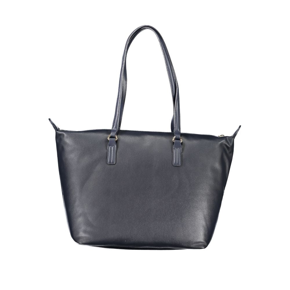 Sac à main pour femme Tommy Hilfiger en polyester bleu, élégant et pratique, avec détails modernes et logo de la marque visible.