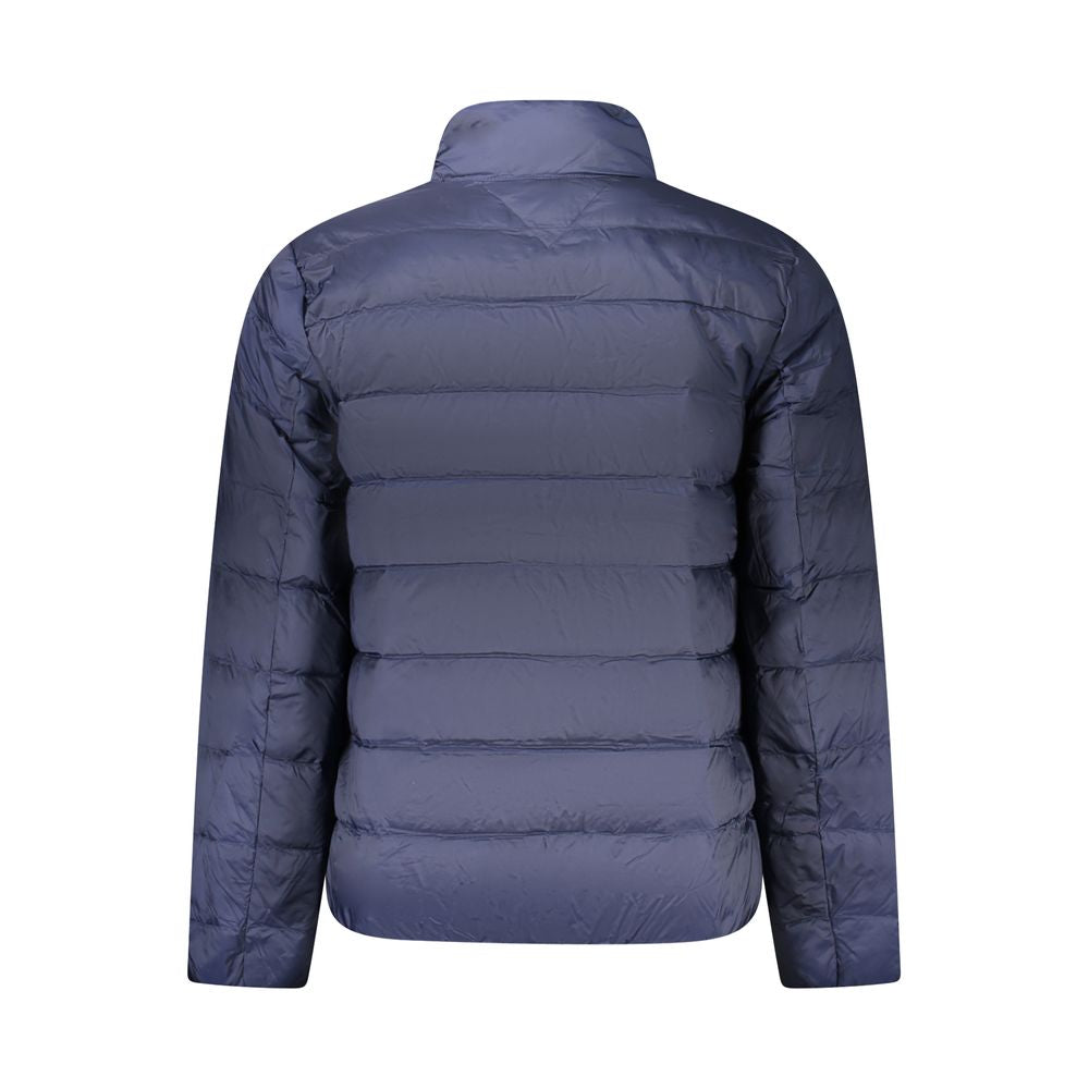 Veste en polyester pour homme de Tommy Hilfiger, coupe classique, couleur bleue, avec détails de marque visibles.