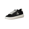 Sneakers en cuir noir pour femmes de la marque Calvin Klein, vue de côté avec semelle blanche.