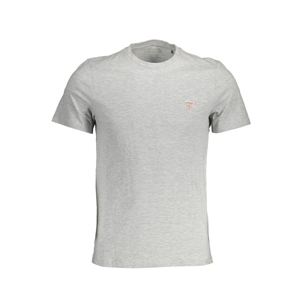 T-shirt gris en coton pour homme de la marque Guess Jeans, coupe classique et tissu doux visible sur l'image.