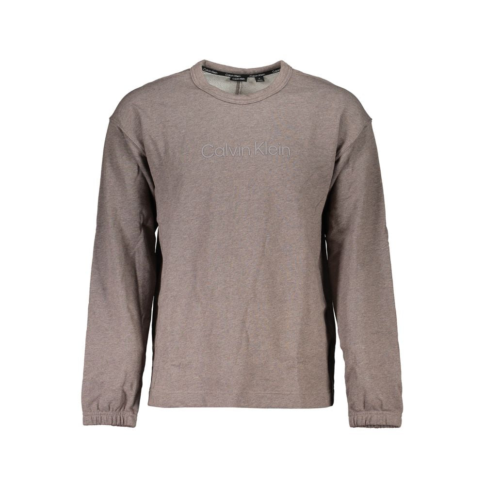 Sweatshirt homme en coton marron de la marque Calvin Klein, look décontracté avec logo discret sur la poitrine.