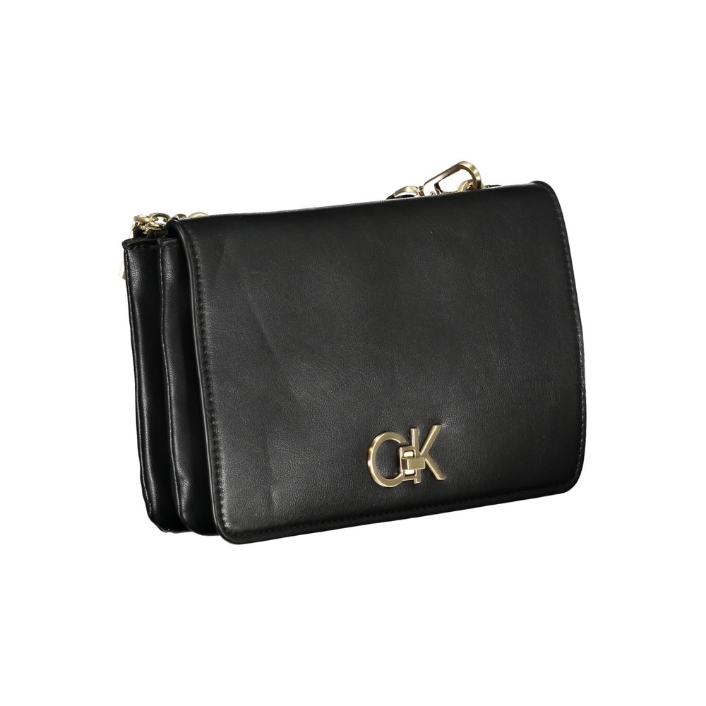 Sac à main noir en polyester pour femmes de la marque Calvin Klein, porté sur l'épaule avec détails élégants.