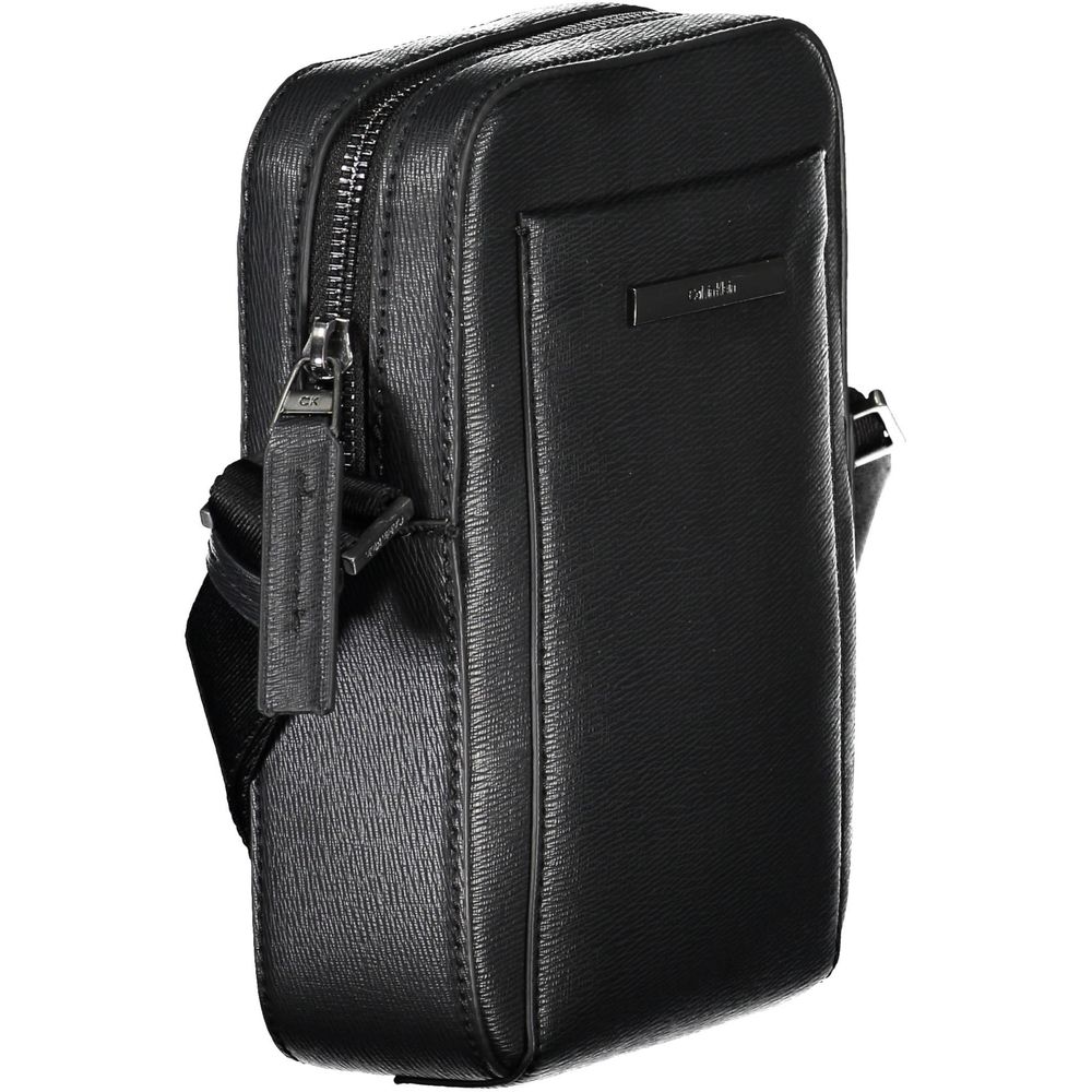 Sac à bandoulière noir en polyuréthane de Calvin Klein pour homme, présenté en vue de face, avec logo visible.
