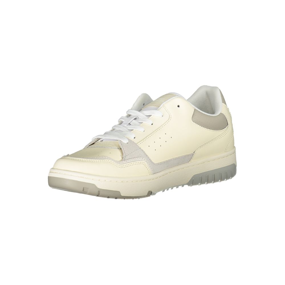 Chaussures de sport beige Tommy Hilfiger avec broderie unique, vue de face, en tissu et semelle blanche.
