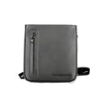Sac à bandoulière noir Tommy Hilfiger en polyuréthane pour homme, avec poches et détails élégants visibles.