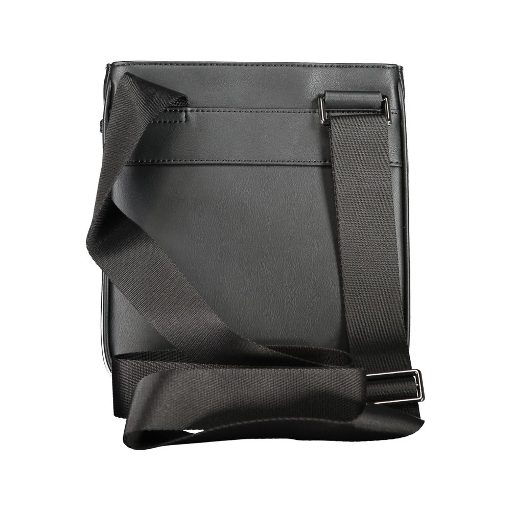 Sacoche homme Tommy Hilfiger en polyuréthane noir avec bandoulière, style moderne et élégant pour un usage quotidien.