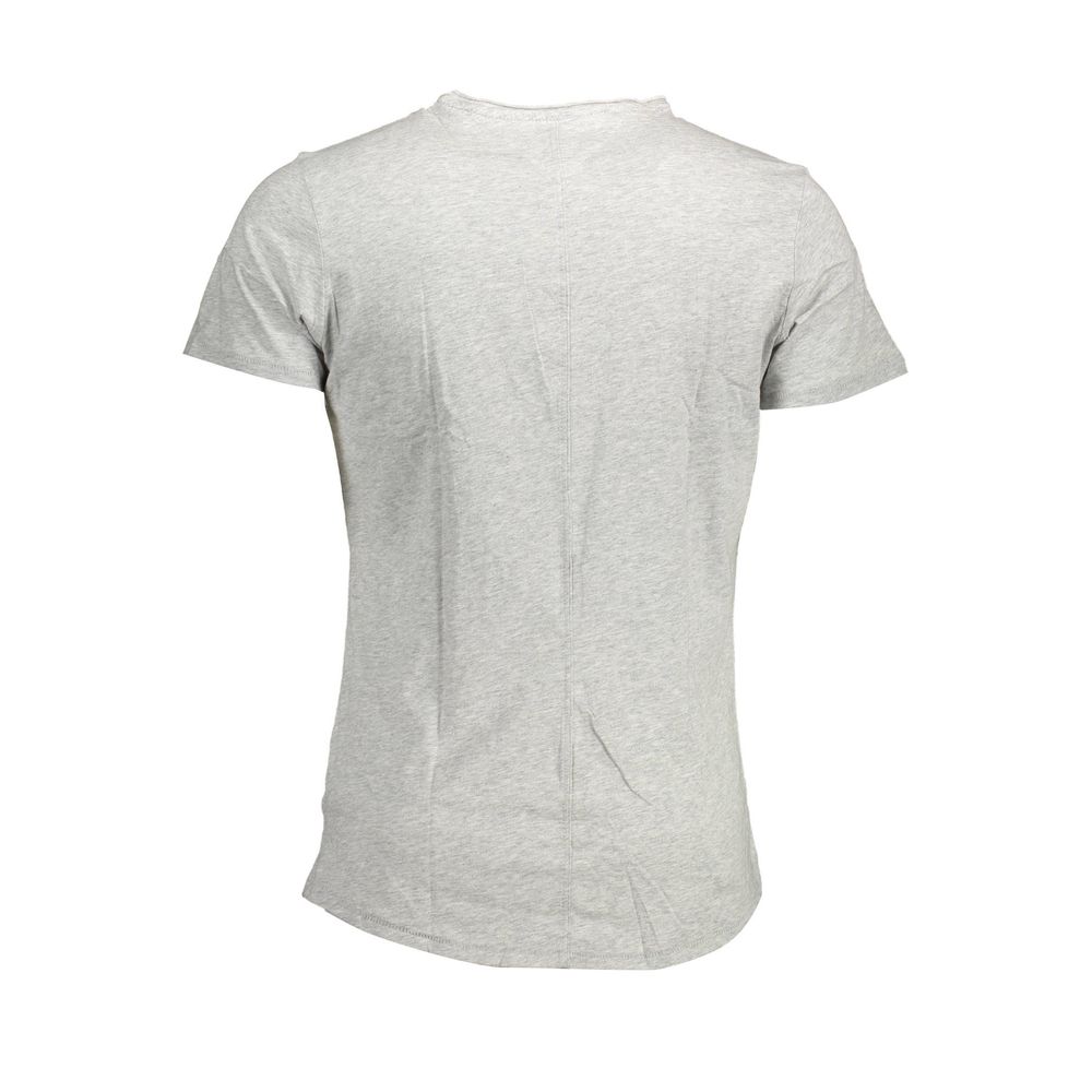 T-shirt homme en coton gris de Tommy Hilfiger, style classique avec col rond et logo discret sur la poitrine.