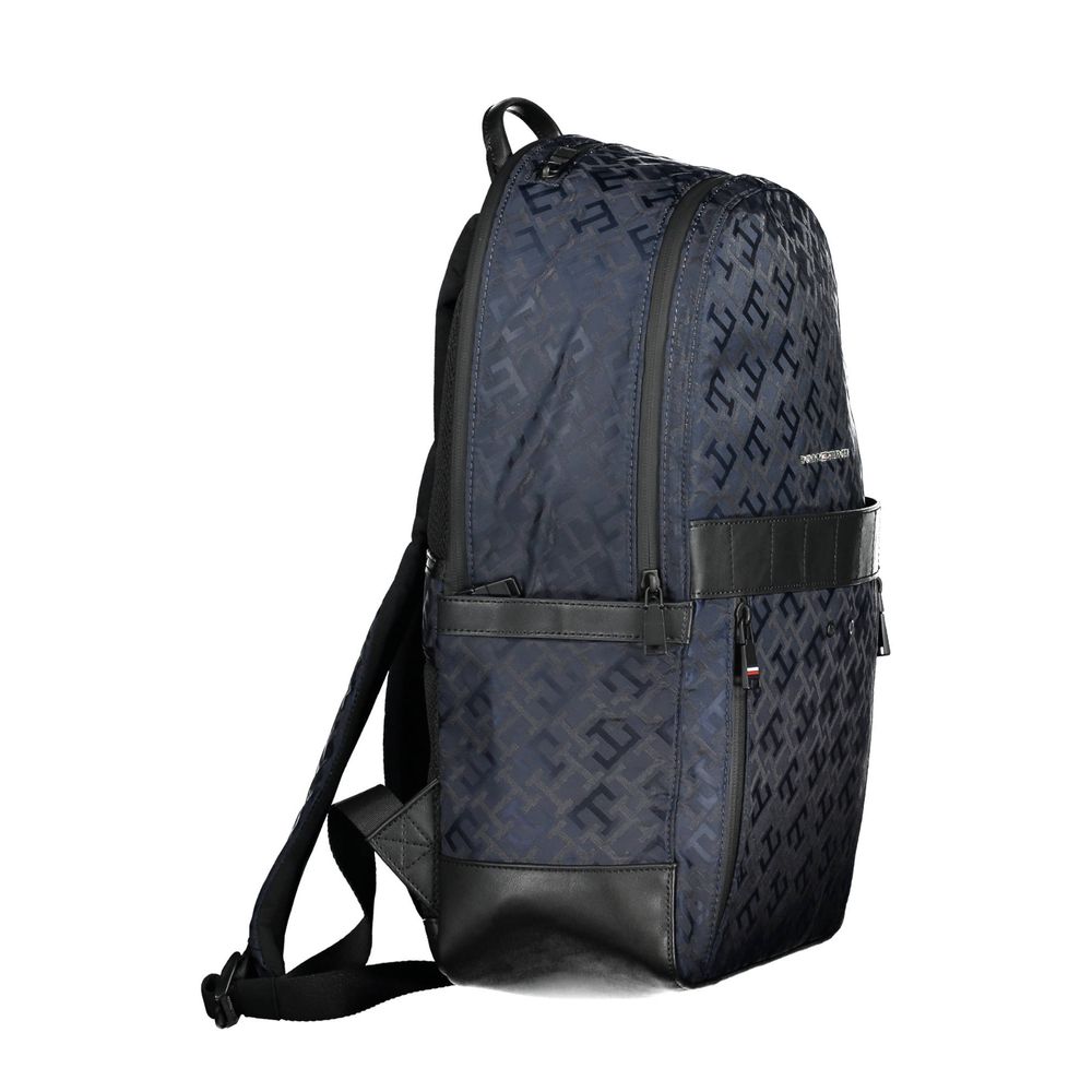 Sac à dos homme Tommy Hilfiger en polyester bleu, avec poches et poignées résistantes, idéal pour le quotidien.