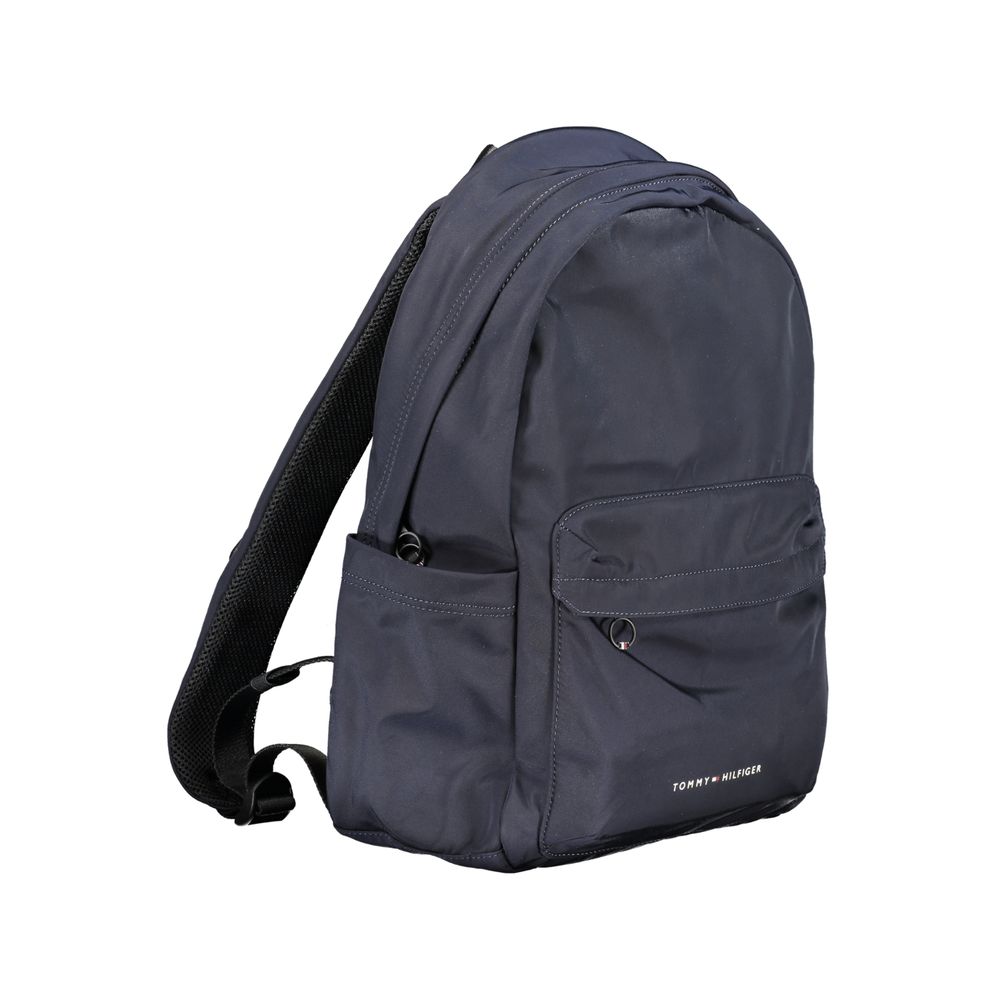 Sac à dos pour homme Tommy Hilfiger en polyester bleu, avec compartiments et logo emblématique visible.