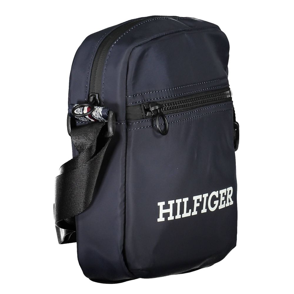 Sac à bandoulière en polyester bleu Tommy Hilfiger pour homme, avec logo visible sur la poche avant.