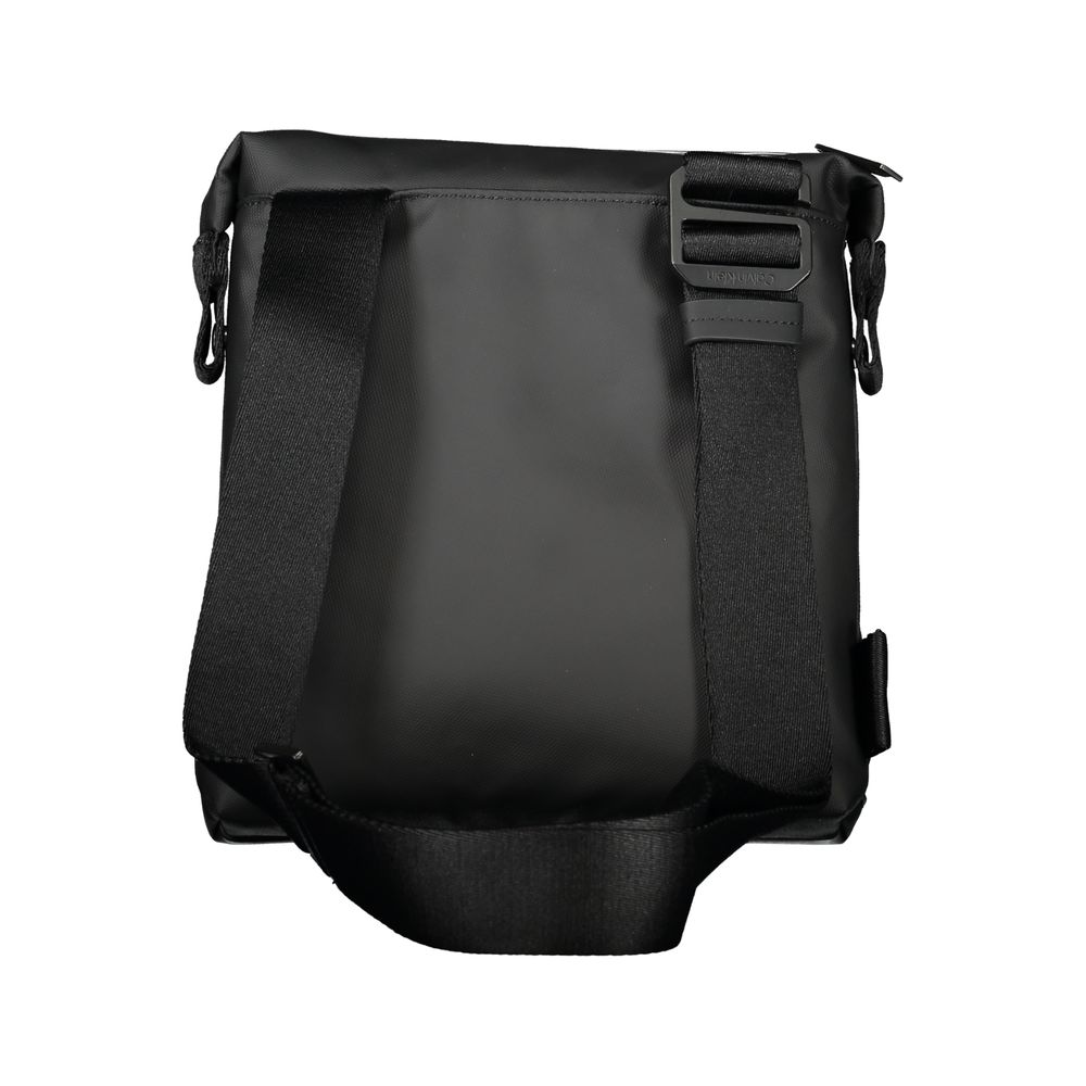 Sac à épaule noir élégant Calvin Klein avec détails contrastés, visible avec bandoulière et finition sophistiquée.