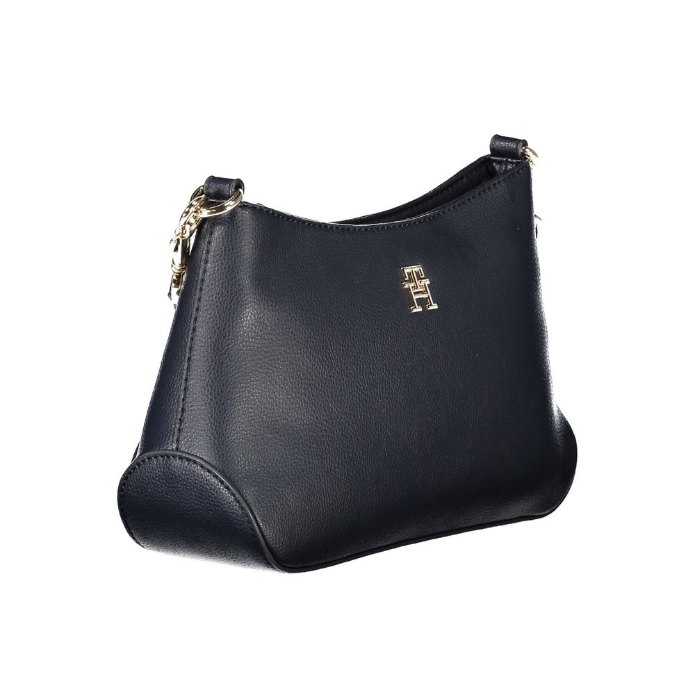 Sac à main pour femme Tommy Hilfiger en polyester bleu, sac à bandoulière élégant avec détails modernes.