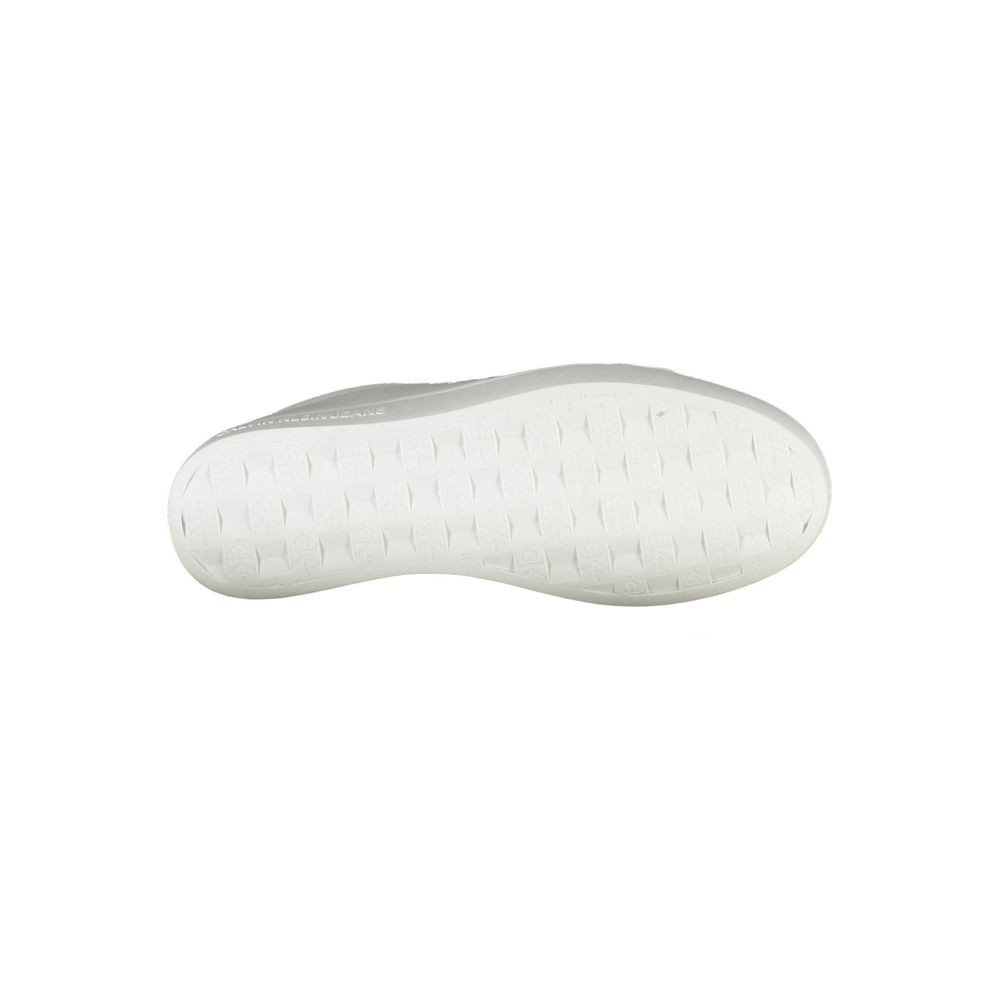 Sneakers pour femmes Calvin Klein en cuir blanc, style moderne et confortable, vue de face avec détails en cuir et semelle blanche.