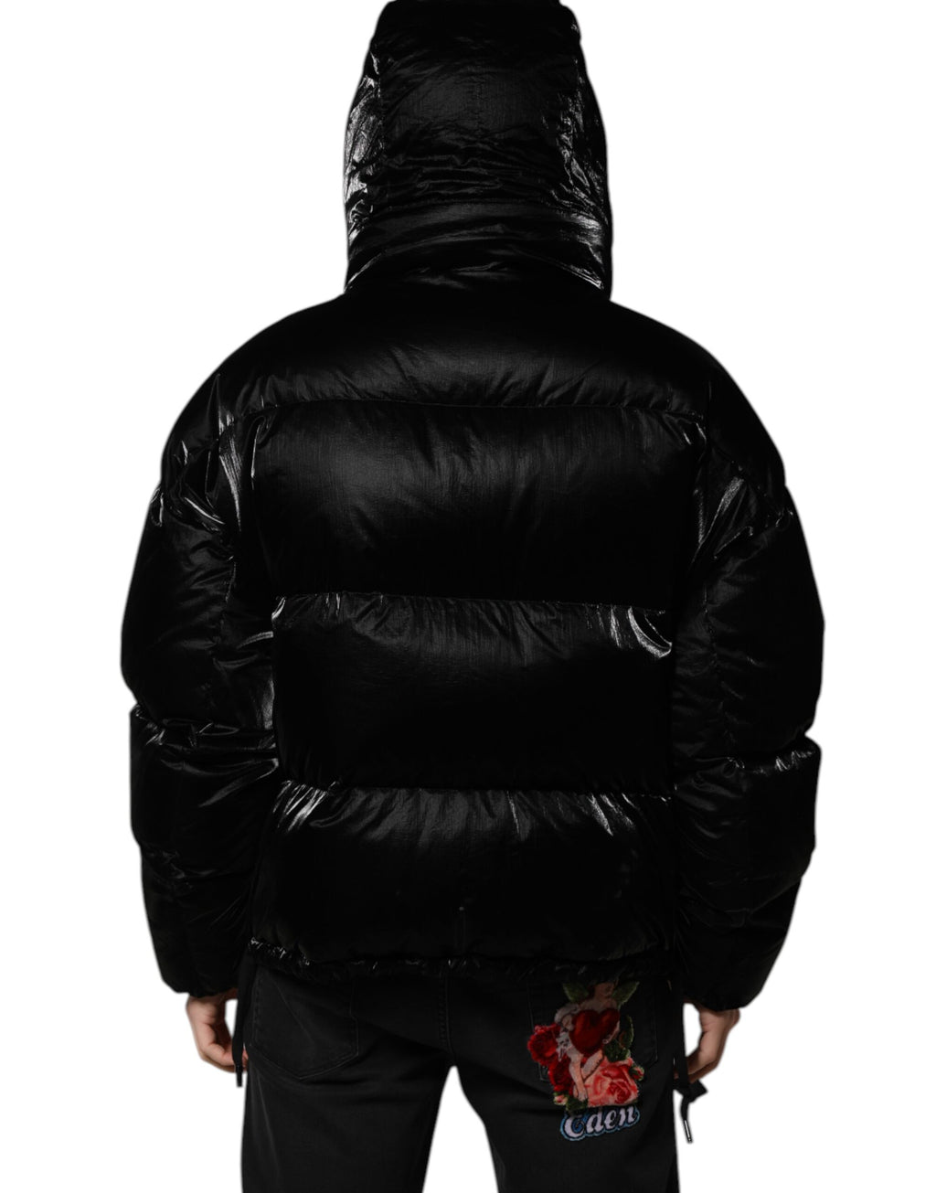Veste à capuche matelassée noire Dolce & Gabbana avec logo, fermeture éclair intégrale et design élégant.