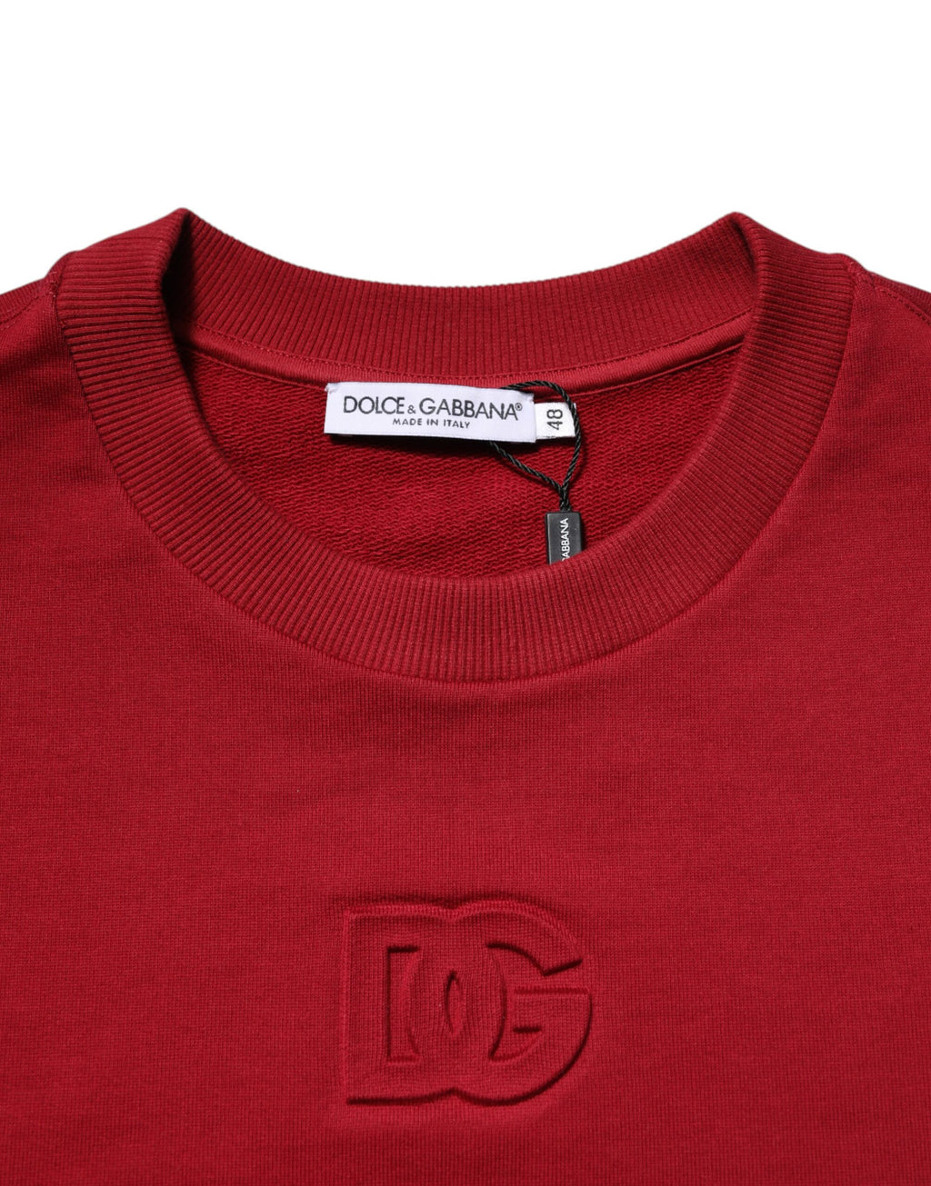 Pull Dolce & Gabbana rouge en coton avec logo embossé, col rond, vue de face.