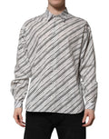 Chemise formelle pour homme Dolce & Gabbana à rayures blanches à manches longues, élégante et sophistiquée.