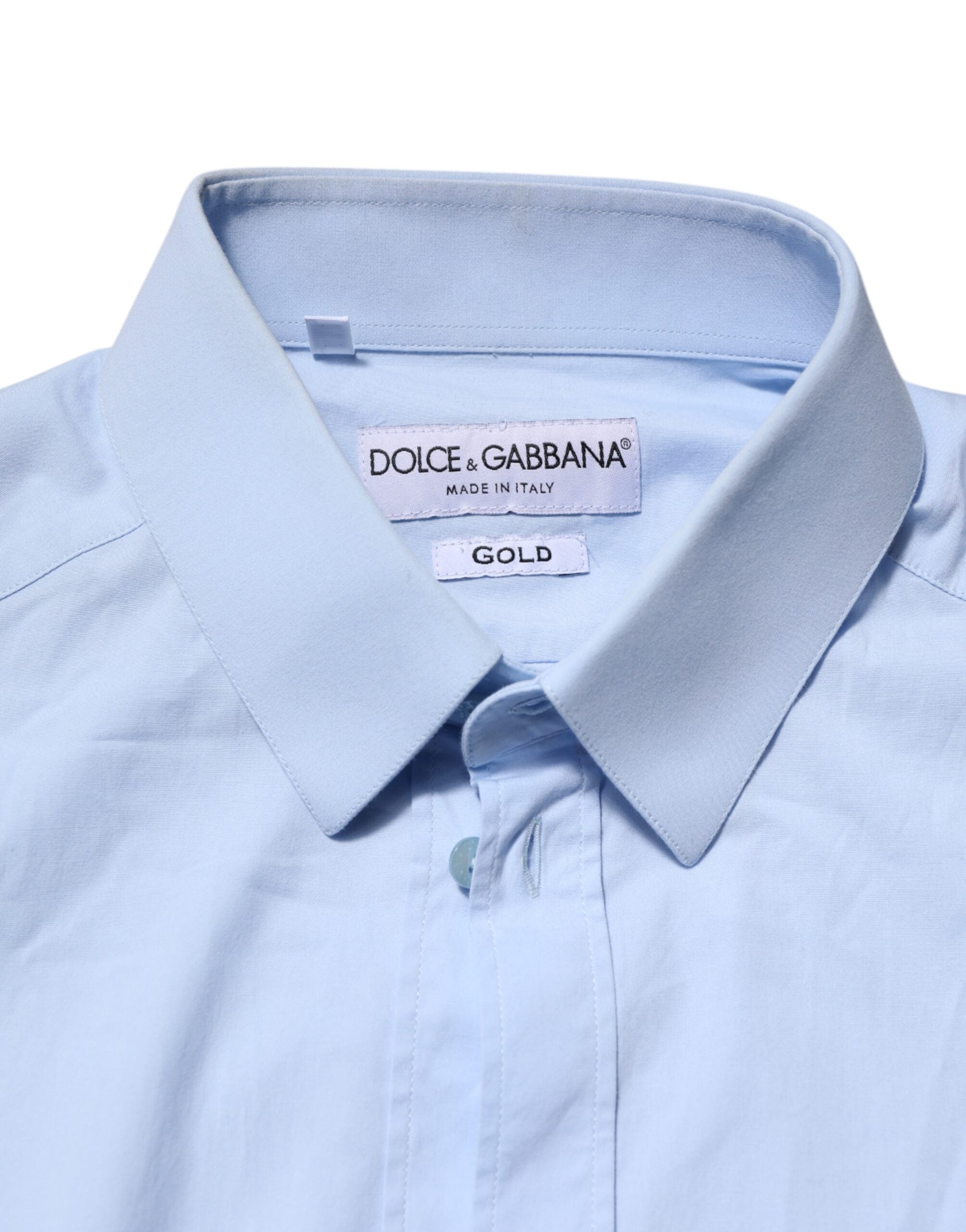 Chemise en coton bleu ciel Dolce & Gabbana à manches longues avec détails dorés, élégante et sophistiquée.