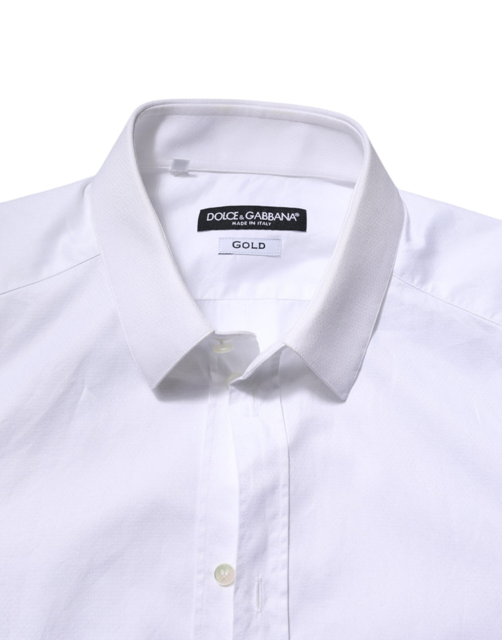 Chemise homme blanche en coton Dolce & Gabbana avec manches longues et détails dorés pour une tenue élégante.