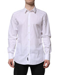 Chemise blanche en coton Dolce & Gabbana à manches longues avec détails en or, vue de face sur un mannequin.