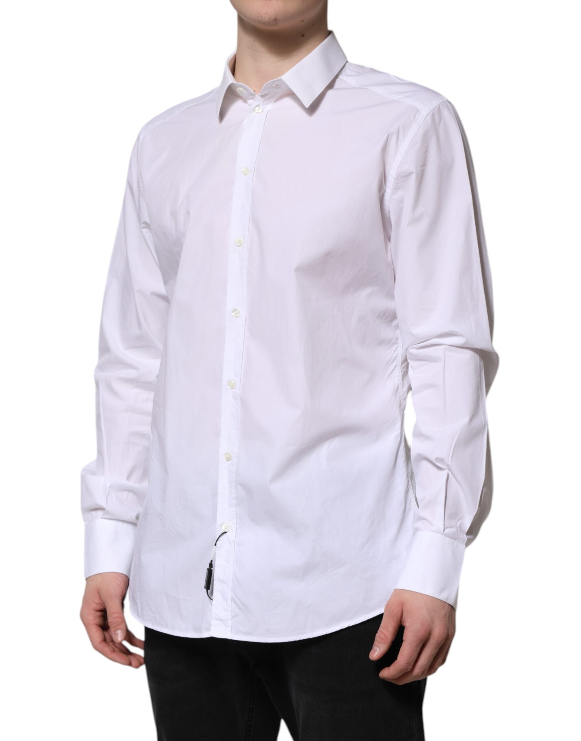 Chemise blanche en coton Dolce & Gabbana à manches longues avec détails en or, vue de face sur un mannequin.