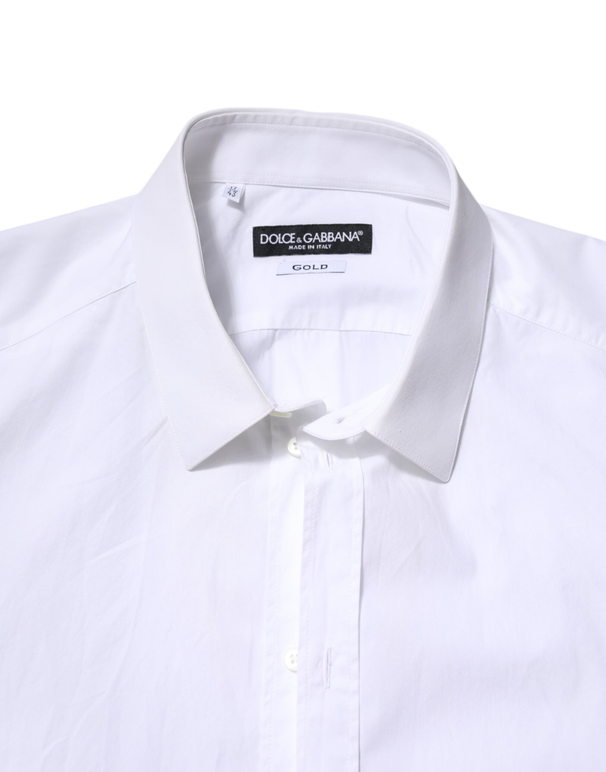 Chemise blanche en coton Dolce & Gabbana à manches longues avec détails dorés, élégante et sophistiquée.