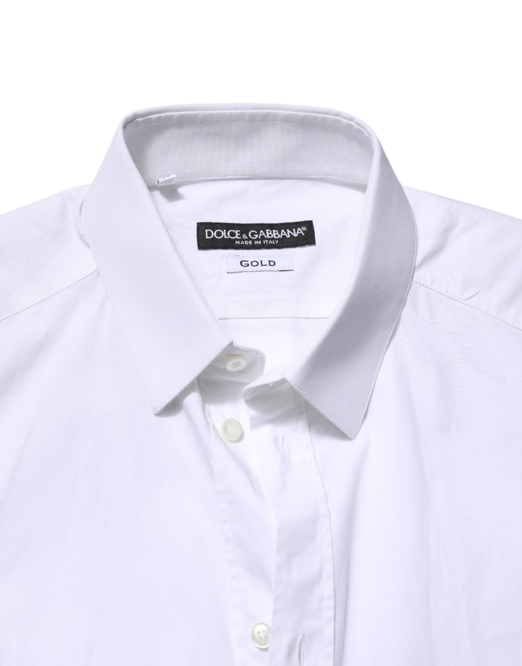 Chemise Dolce & Gabbana en coton blanc à manches longues avec détails dorés, élégante et sophistiquée.